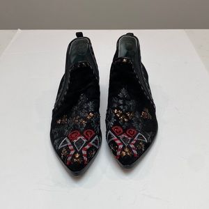 Black Loafers with Intricate Stitching